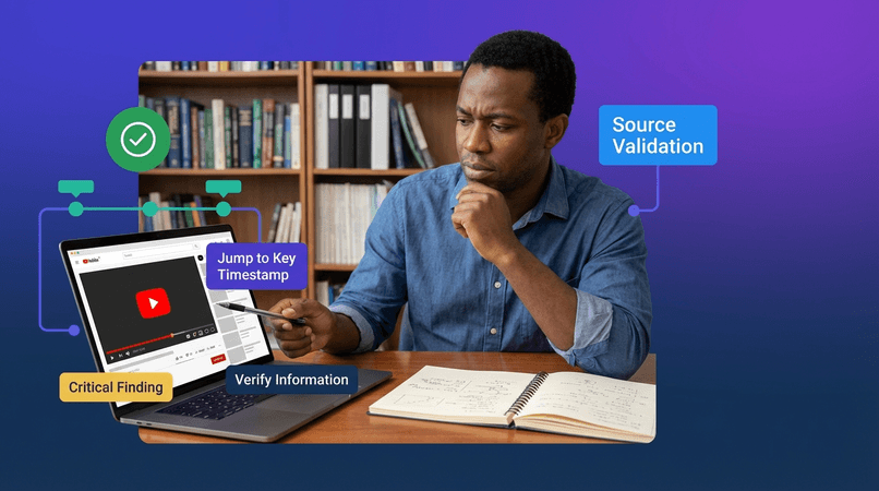 Professional photo of a focused researcher at a desk with laptop showing a YouTube video